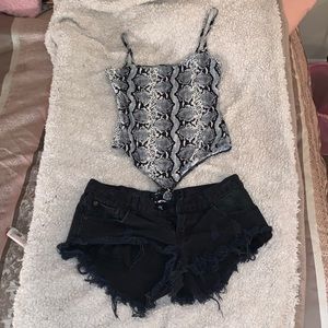 black animal print onesie